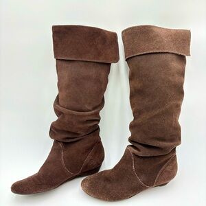 Brown suede boots.